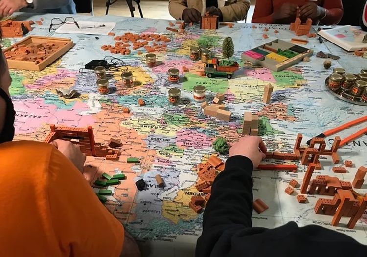 Photo of a the group making artwork