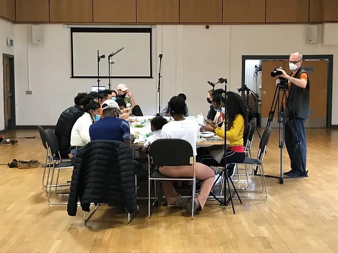 Group photo of young people doing artwork